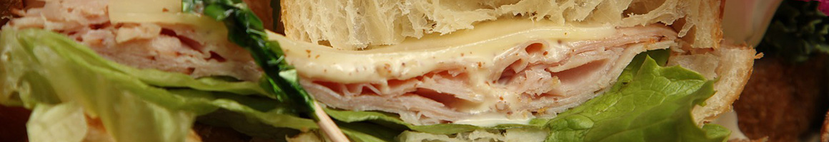 Eating Sandwich Vegetarian Bakery at Bread Basket Bakery restaurant in Cheyenne, WY.